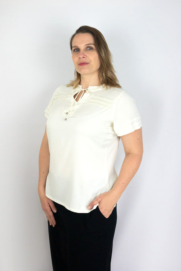 Blusa escote con abertura