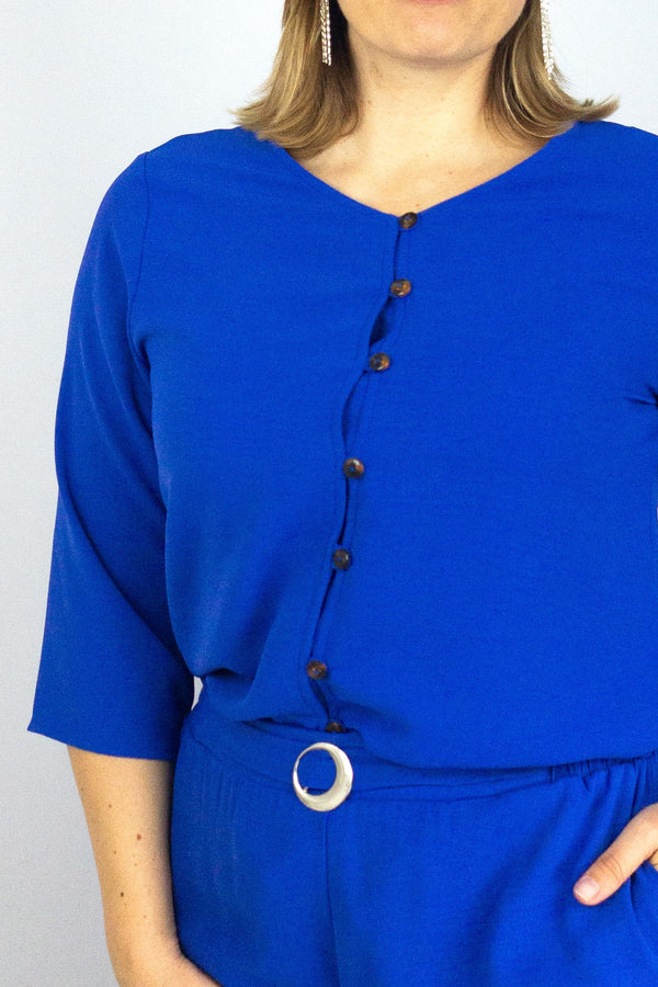 Blusa cuello V con perilla