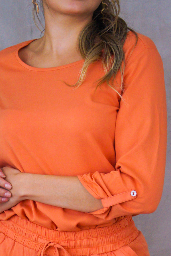 Blusa cuello redondo manga 3/4