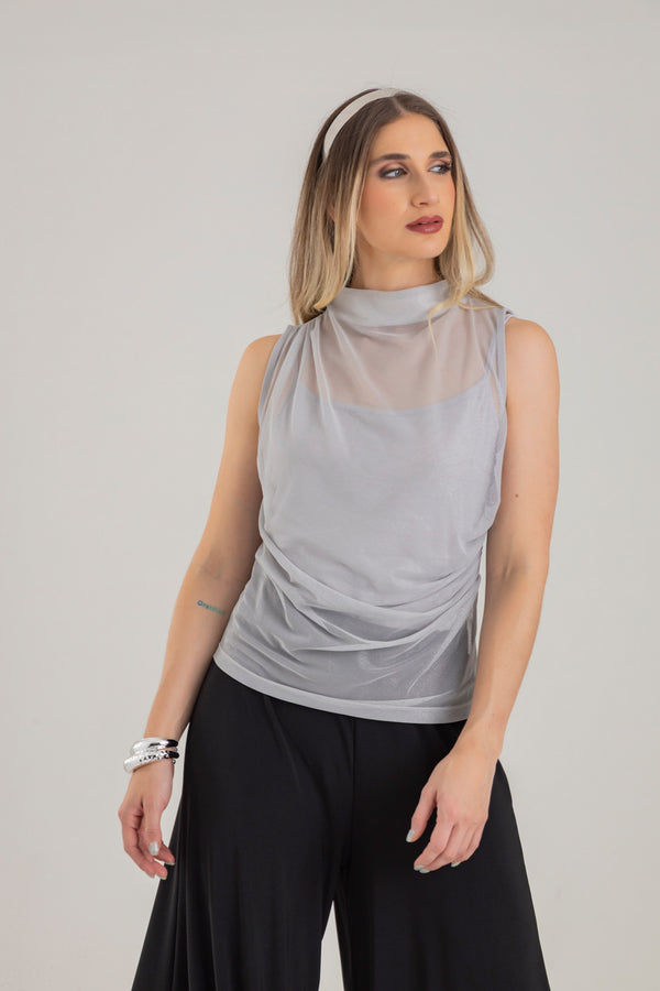 Blusa escote ojal